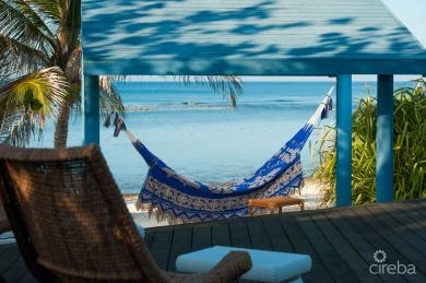LITTLE CAYMAN BEACHFRONT HOME WITH 2 LOTS AND POOL