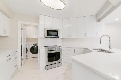 BRITANNIA LIONS COURT #324 - ELEGANT 3-BEDROOM CORNER UNIT | 2,100 SQFT | GOLF COURSE VIEWS
