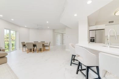 BRITANNIA LIONS COURT #324 - ELEGANT 3-BEDROOM CORNER UNIT | 2,100 SQFT | GOLF COURSE VIEWS