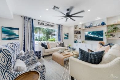 FULLY RENOVATED 4-BED CANAL FRONT HOME WITH DEN & DOCK | THE SHORES