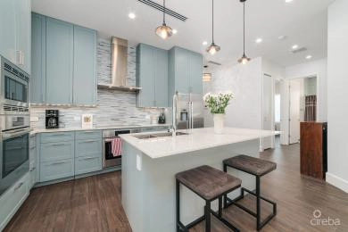 #201 CYPRESS POINTE NORTH - CANAL FRONT CONDO