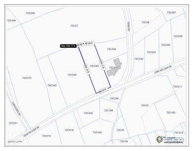 0.45 ACRE MDR LOT WITH PUBLIC ROAD FRONTAGE - EAST END DEVELOPMENT OPPORTUNITY