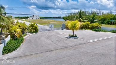 MUSTIQUE COVE LOT WITH DOCK IN A PRIVATE GATED COMMUNITY