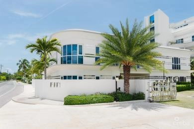 THREE-LEVEL OCEANFRONT FIN PENTHOUSE  #30 PLUS 2 GARAGES